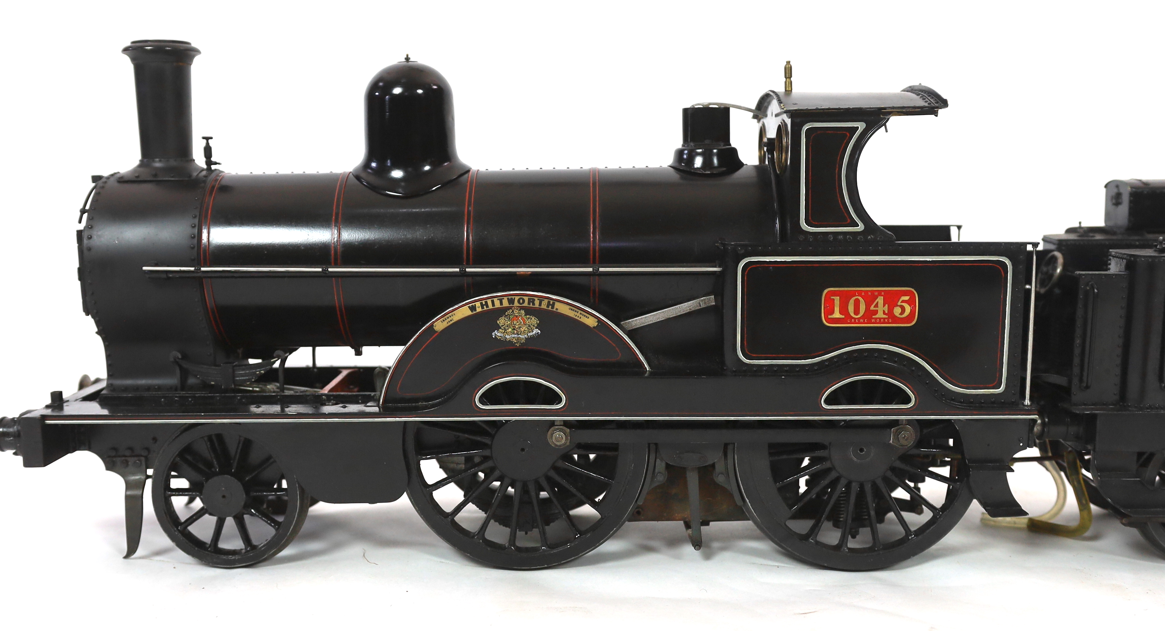 A very finely engineered scratch-built 5” gauge live steam model of a LNWR (London and North Western Railway) Jumbo 2-4-0 tender locomotive, No. 1045 ‘Whitworth’